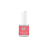 IBD Just Gel Polish She’s Blushing, a soft coral-pink crème gel for a fresh, feminine nail look.