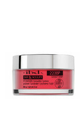 A 2 ounce glass jar containing ibd Dip & Sculpt Sunset Strip nail dip powder