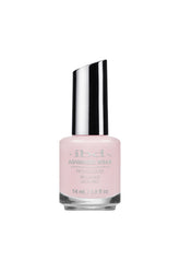 IBD Advanced Wear in Froze, a soft, pale pink that offers a clean and delicate manicure for any occasion.