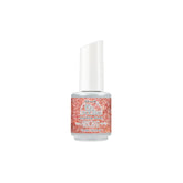 IBD Just Gel Polish Anything Glows, a coral-pink glitter gel polish packed with vibrant sparkle and shine.