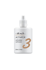 ibd Activator Step 3 2oz, speeds up the drying process for dip nails, ensuring a smooth and durable finish.