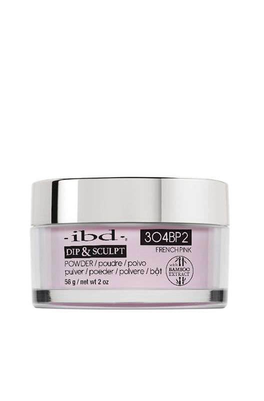 Front view of a 2-ounce clear container of ibd Dip & Sculpt French Pink featuring its pastel pink nail powder contents