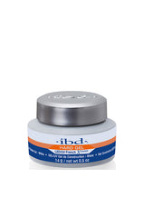 A 2-ounce grey plastic tub of ibd French Extreme White gel with the product label