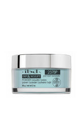 Capped clear glass 2 ounce jar of ibd Dip & Sculpt Just Keep Swimming printed with product name & label