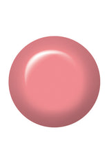 Swatch of IBD Flowerful, a bright rose-coral crème that brings sunny warmth to any look.