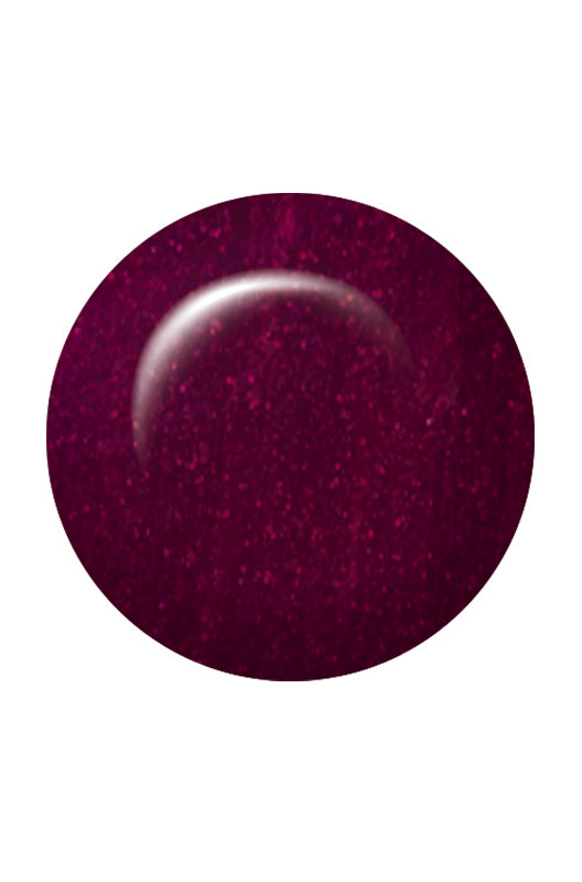 Swatch of IBD Maui Sunset, a deep plum-red sparkle that reflects light for a radiant, sophisticated glow.