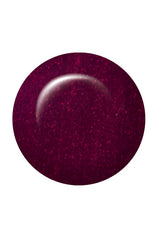 Swatch of IBD Maui Sunset, a deep plum-red sparkle that reflects light for a radiant, sophisticated glow.