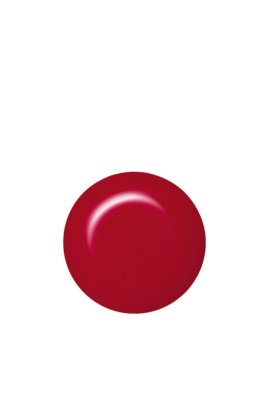 Swatch of IBD Luck of the Draw, a cheerful cherry red cream with a classic high-gloss finish for everyday glam.