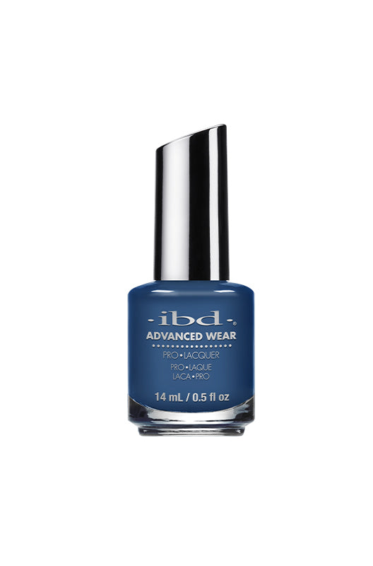 IBD Advanced Wear Lacquer in Blue Me a Beso, a muted blue nail polish with a sophisticated, high-shine finish.