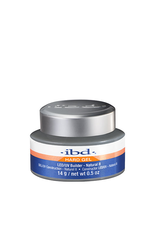 A 0.5-ounce grey tub container of ibd Hard Gel LED/UV - Natural II facing forward featuring its product label