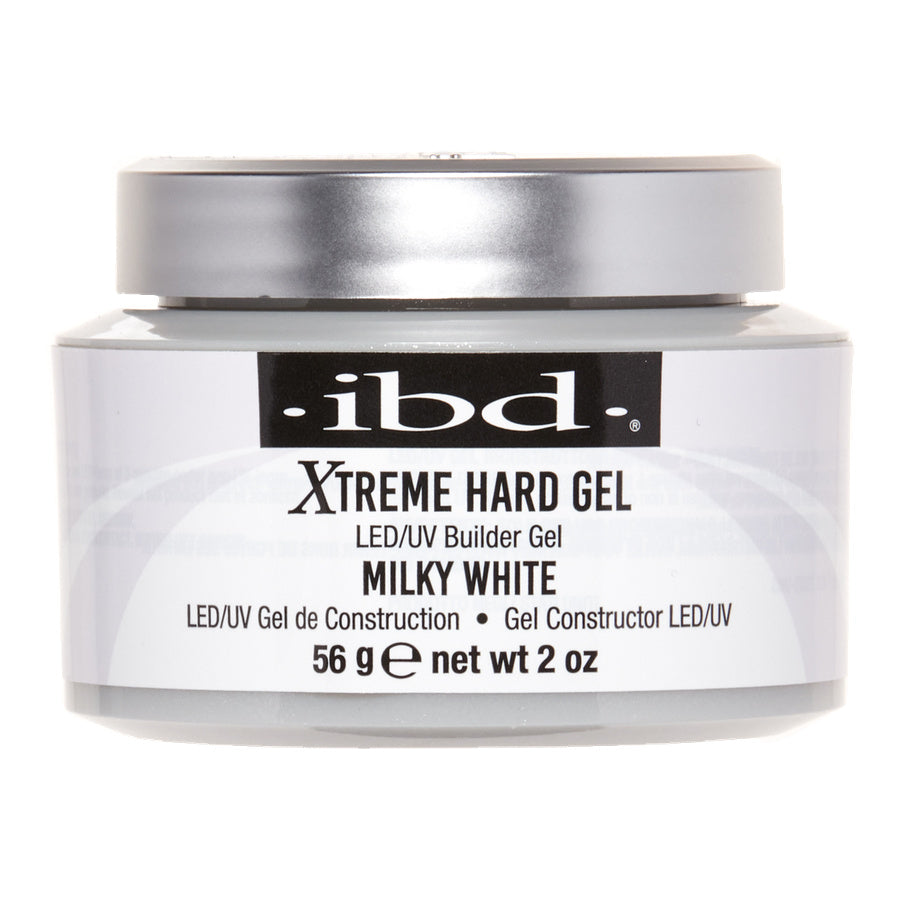 A jar of IBD Xtreme Hard Gel LED/UV Builder Gel in Milky White, featuring a white body, a metallic silver lid, and a black label with white text.