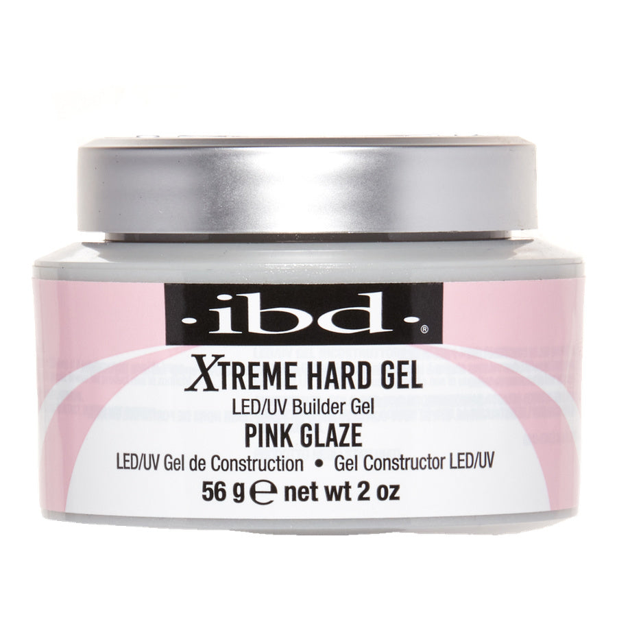 A jar of ibd. Xtreme Hard Gel LED/UV Builder Gel in Pink Glaze, 56 g (2 oz), with a silver lid and a pink and white label.