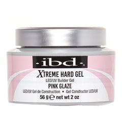 A jar of ibd. Xtreme Hard Gel LED/UV Builder Gel in Pink Glaze, 56 g (2 oz), with a silver lid and a pink and white label.