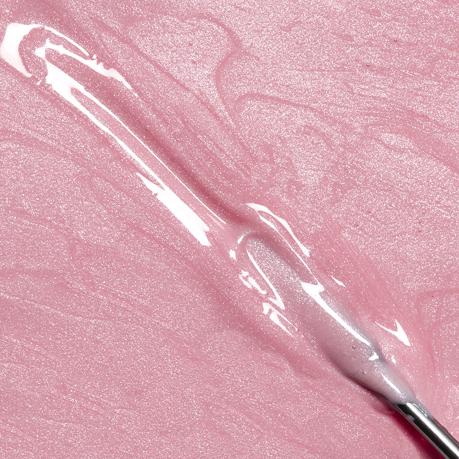 A close-up of IBD Xtreme Hard Gel LED/UV Builder Gel in the shade Rose Luster