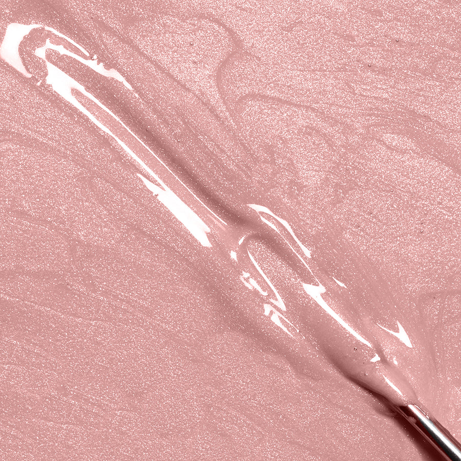 A close-up of IBD Xtreme Hard Gel LED/UV Builder Gel in the shade Champagne Sparkle