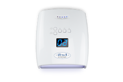 Top view of ibd PRO Cordless LED/UV Lamp featuring its stamped ibd branding, operation buttons, & LCD timer screen