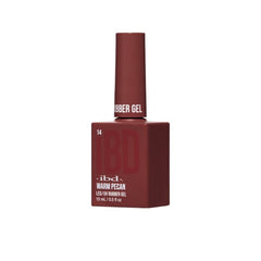 Angled view of IBD Rubber Gel Warm Pecan bottle featuring a deep, toasty brown hue.