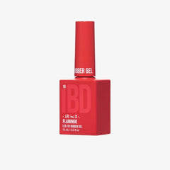 Angled view of IBD Rubber Gel Flamingo bottle showing off its bold red-coral tone and modern design.