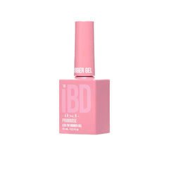 Angled view of IBD Rubber Gel Primrose bottle, showcasing its light pastel pink color and modern matte look.