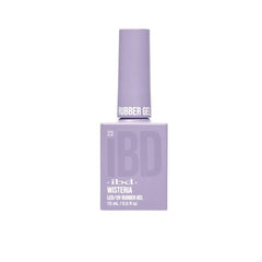 IBD Wisteria Rubber Gel in a pale lavender bottle, perfect for subtle, floral-inspired manicures.