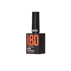 ibd Flash Gel Astro angled bottle, LED/UV flash gel in a striking orange sparkle hue.