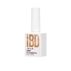 Angled view of IBD Comet Magnetic Gel 15mL bottle, highlighting sleek design and gold metallic branding.