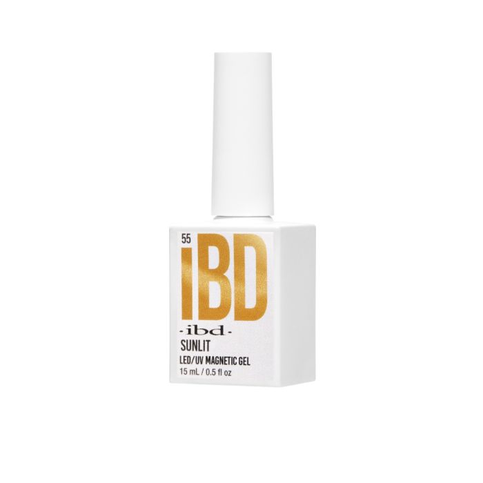 Side angle of IBD Sunlit Magnetic Gel bottle featuring vibrant gold lettering on a sleek white design.
