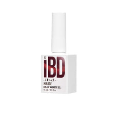 Angled view of IBD Mirage Magnetic Gel bottle in deep red metallic logo and sleek white 15mL packaging.